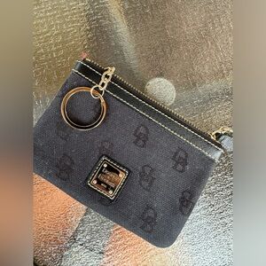 Dooney & Bourke wristlet, black fabric with leather trim and red interior